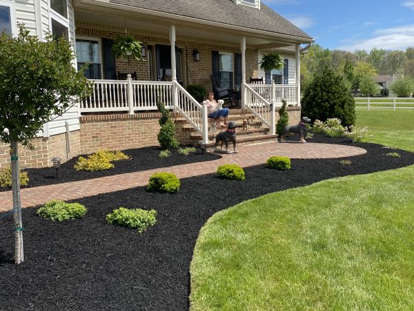 new landscaping with flowerbeds